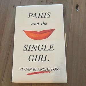Kate Spade “Paris and the Single Girl” book clutch